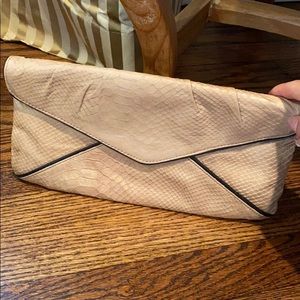 BCBG tan snakeskin clutch